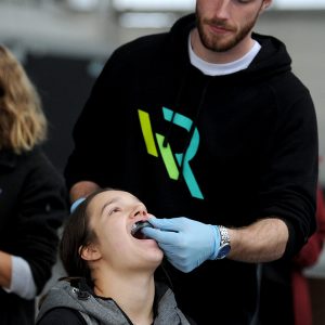 DUNEDIN, NEW ZEALAND - MAY 29: A Prevent Biometrics mouthguard is fitted during the Women's Rugby Day Head Impact Study Programme at Forsyth Barr Stadium on May 29, 2021 in Dunedin, New Zealand. (Photo by Joe Allison/World Rugby via Getty Images)